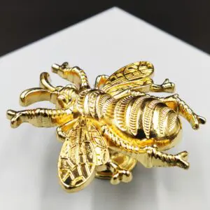 Gałka Żuk - uchwyt meblowy 59x56mm kolor złoty